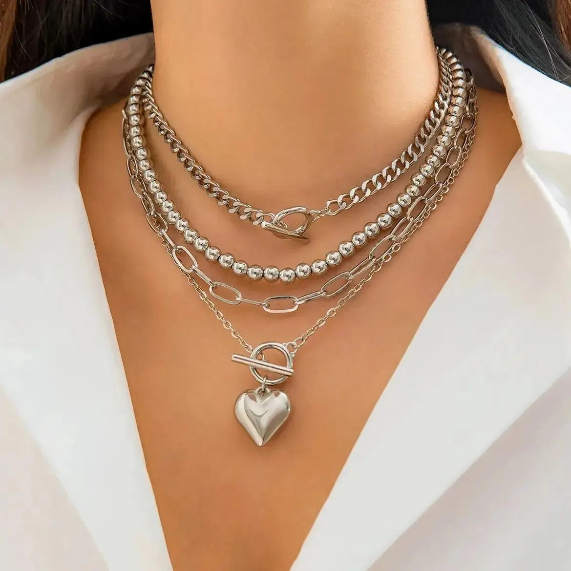Golden Heart Elegance – A 4-Piece Y2K Necklace Set for Bold and Modern Women