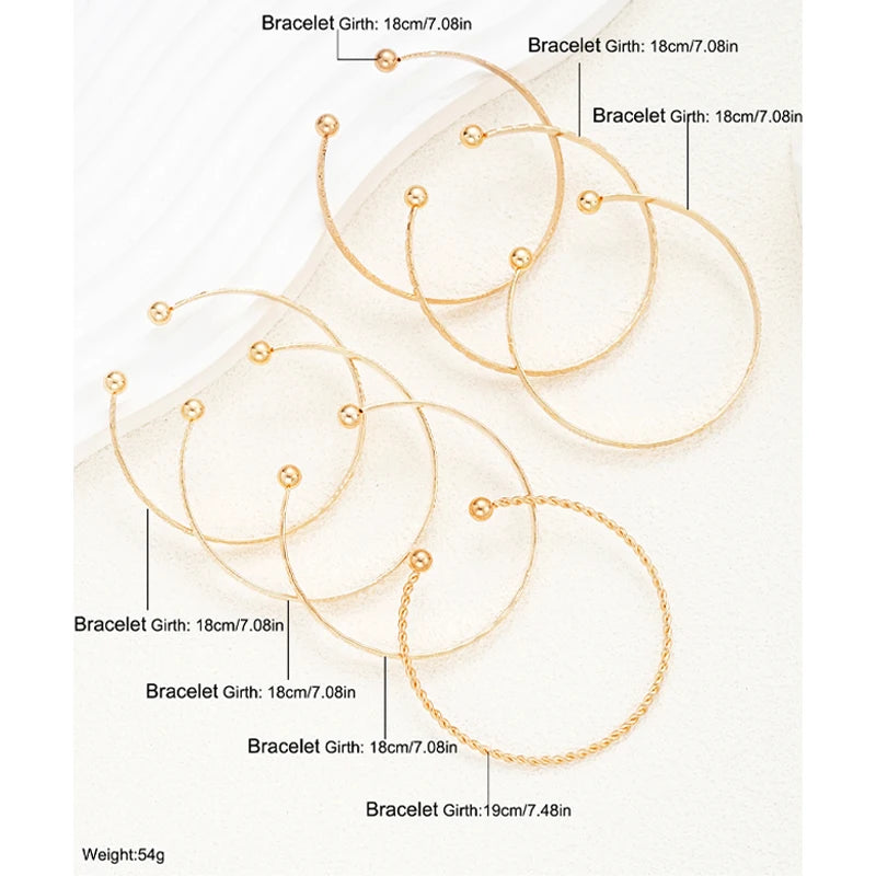 Set of 7 Punk Gold Bracelets – Bold Gothic Heart Prints with Open Metal Design for a Trendy Streetwear Look / 7 Pcs